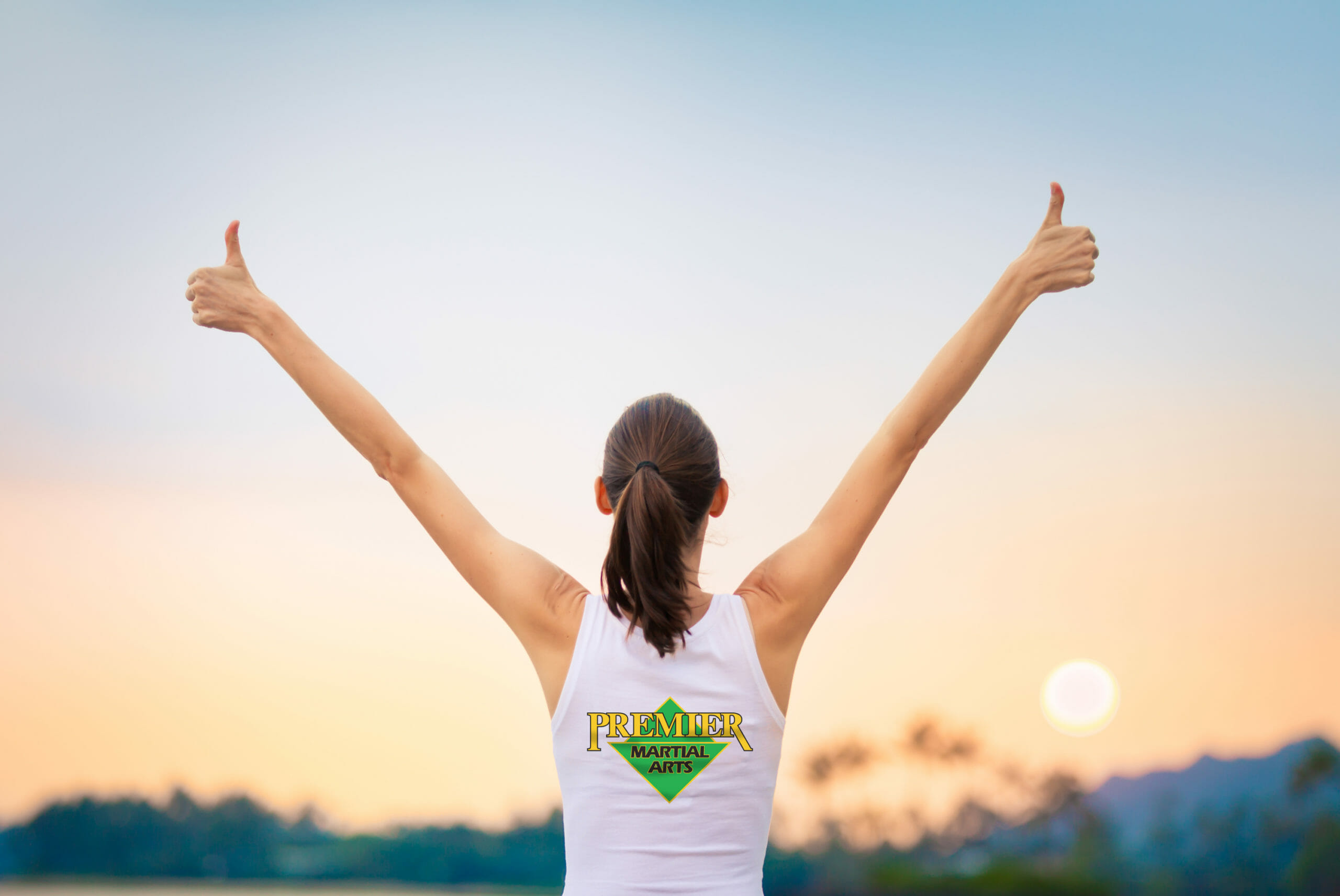 woman with her arms in the air